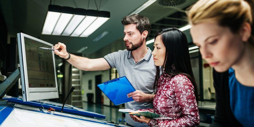 Group of people working on computer