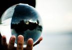 Hand Holding Crystal Ball